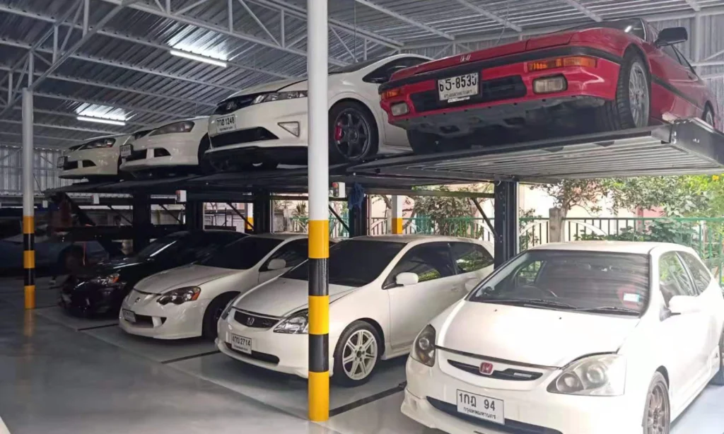 Two-level intelligent parking system efficiently storing multiple cars in a covered garage, demonstrating space-saving intelligent parking solutions for urban areas